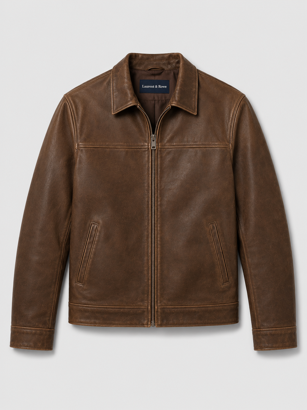Brown men’s leather flight jacket with a zip-up front and loose fit displayed on a plain background
