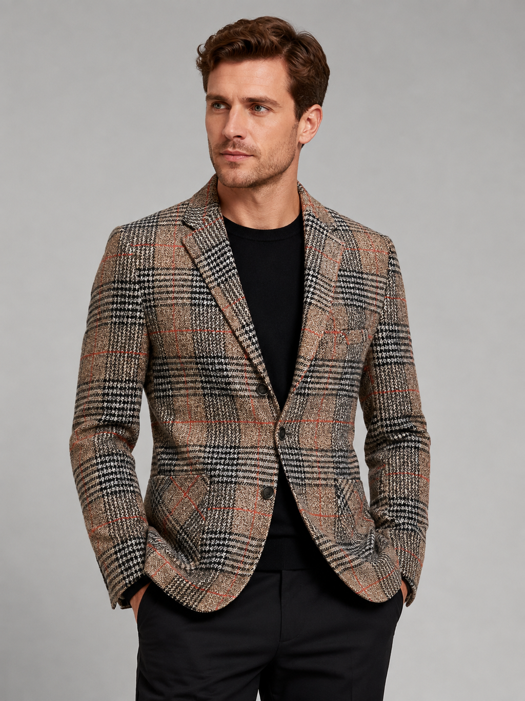 Front view of a man wearing a brown checkered blazer with a slim fit, notched lapel, and tailored business casual design