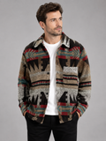 Front view of a man wearing a brown heavyweight flannel shirt jacket with a wool blend, ethnic print, button-up front, and relaxed shacket fit