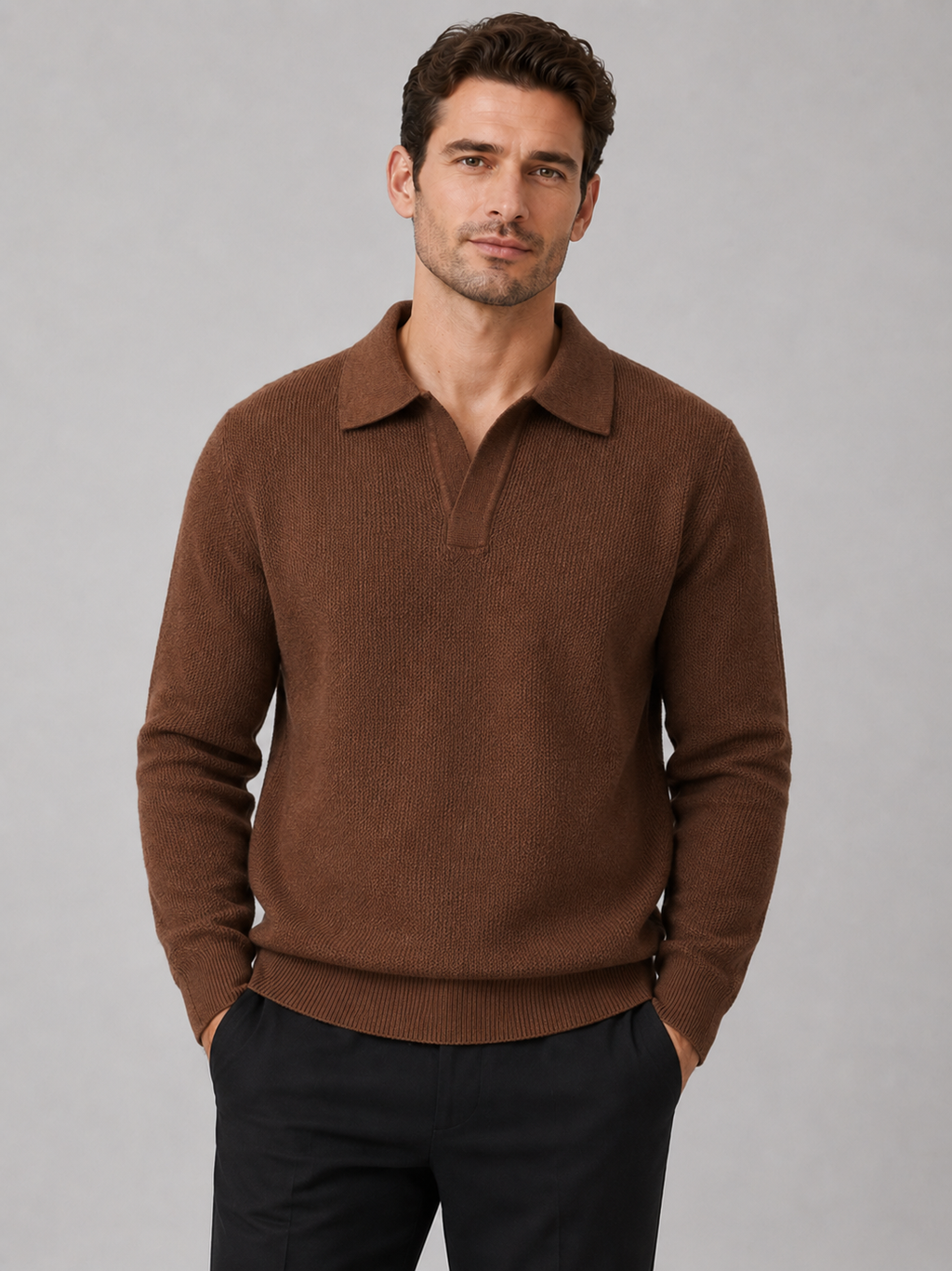 Front view of a man wearing a brown heavyweight knit Johnny collar sweater with long sleeves