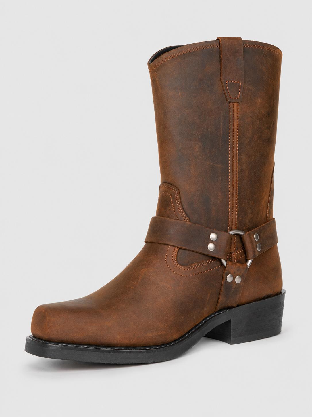 Angled view of brown men’s mid calf cowboy boots with a leather upper, slip-on design, western style, and durable outsole