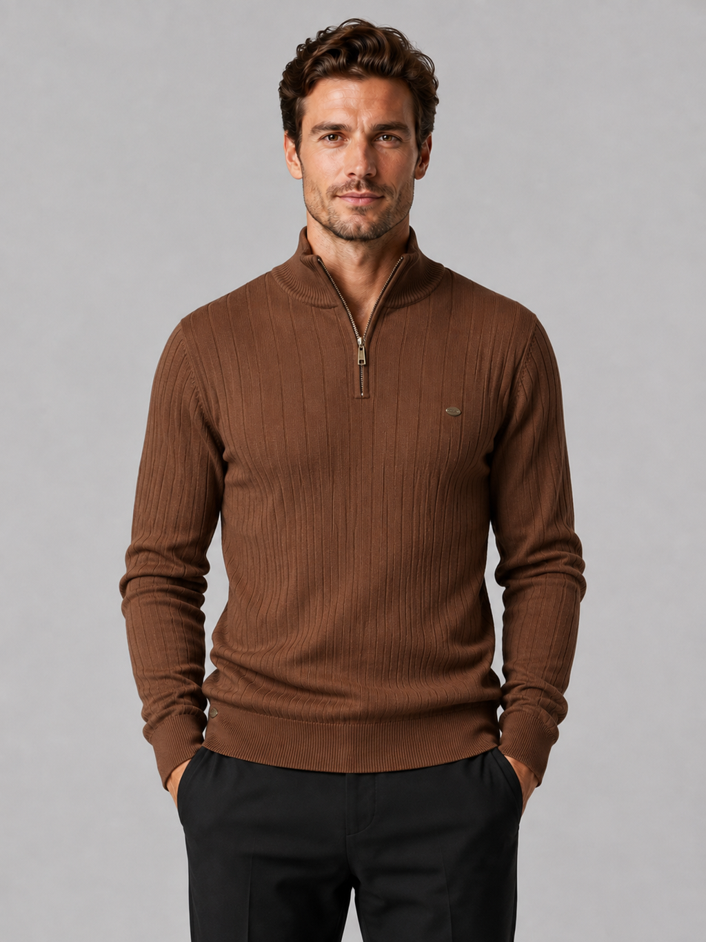 Front view of a man wearing a brown quarter zip pullover sweater with a stand collar, warm cotton knit, and long sleeves