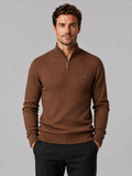Front view of a man wearing a brown quarter zip pullover sweater with a stand collar, warm cotton knit, and long sleeves