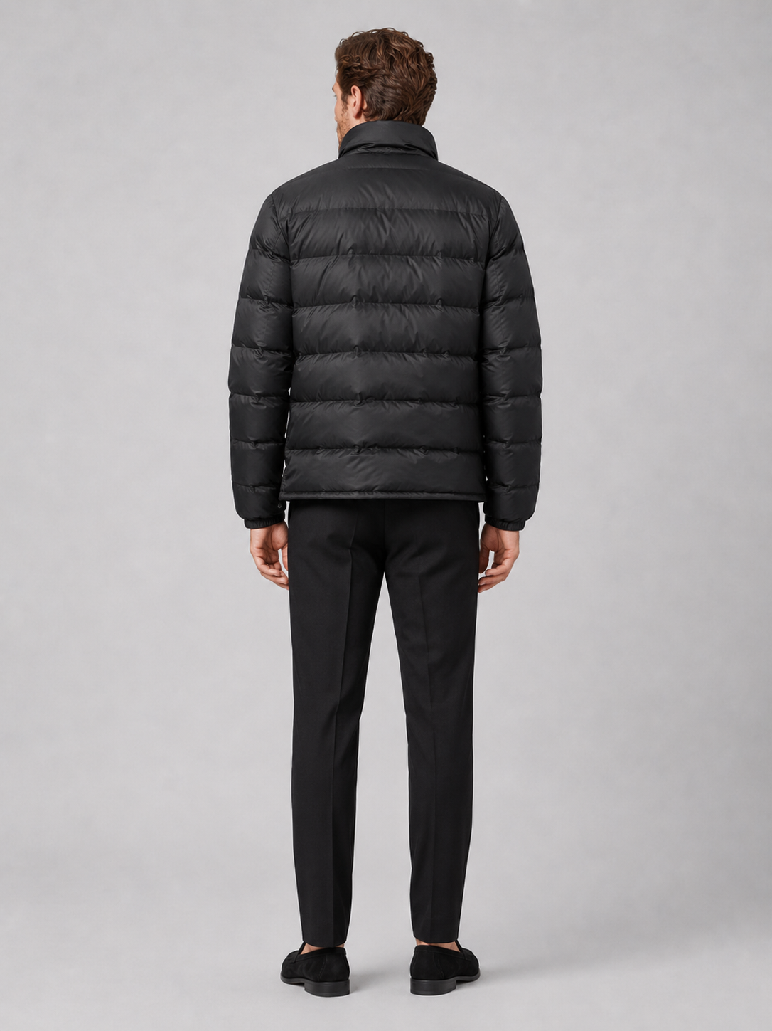 Men’s black insulated down jacket comfortable cold weather outerwear for hiking, travel, and casual outfits