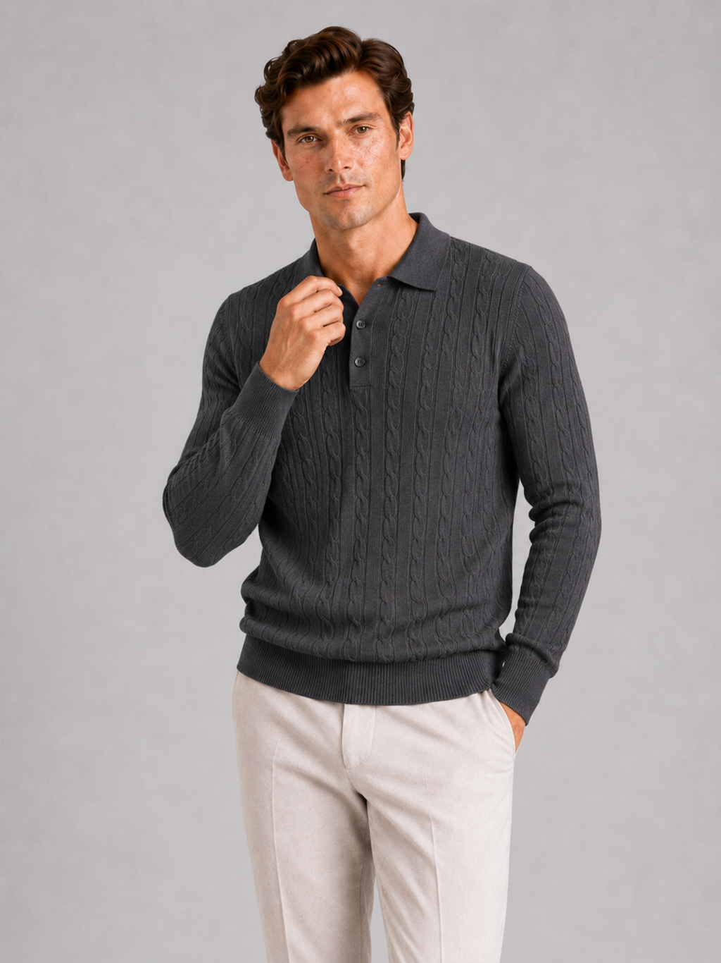 Men wearing dark gray cable knit long sleeve polo winter layer for business casual style
