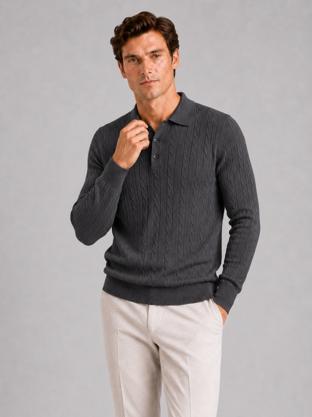 Men wearing dark gray cable knit long sleeve polo winter layer for business casual style