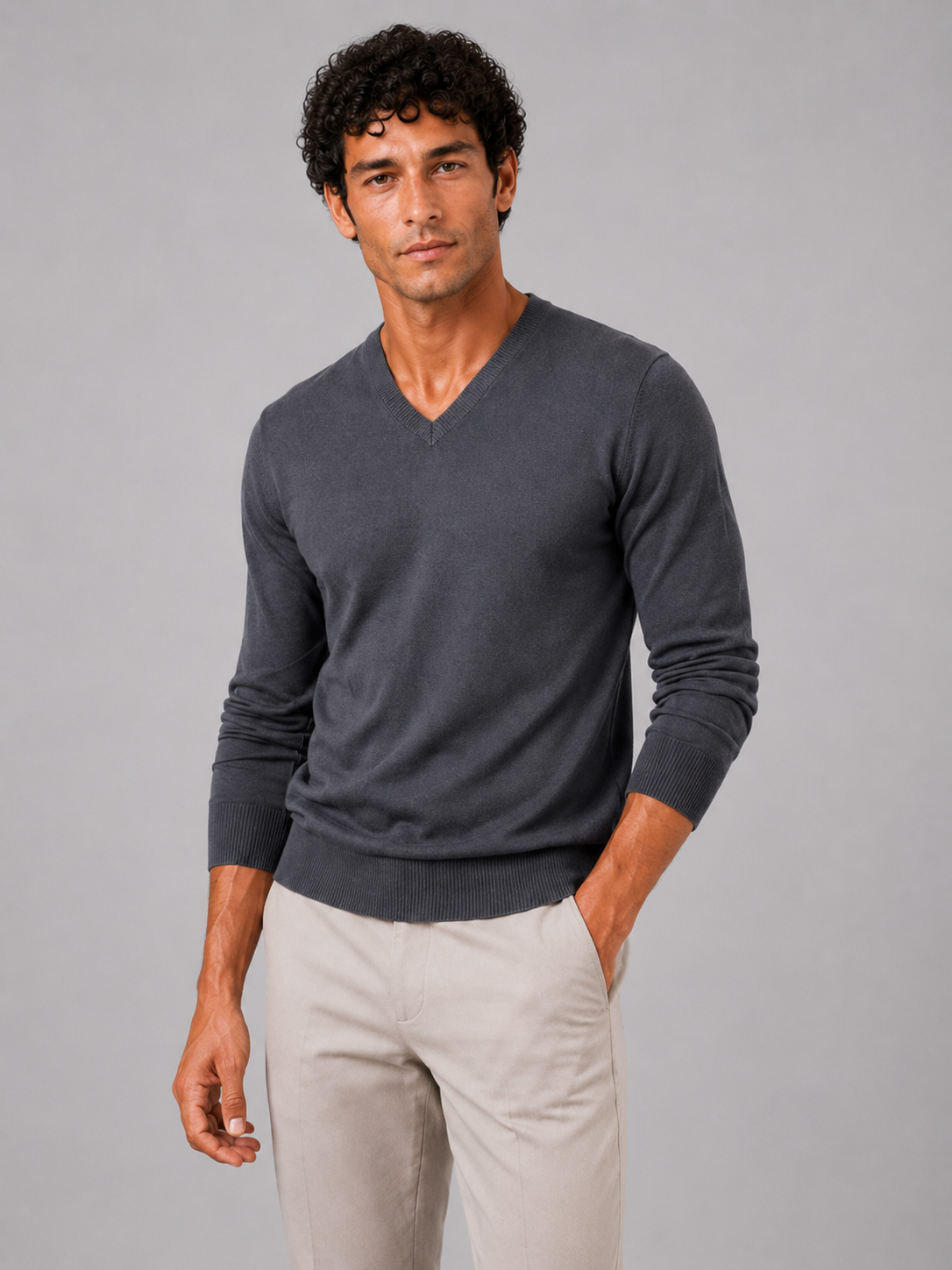 Men wearing dark gray v neck knit sweater slim fit long sleeve lightweight fall business casual style