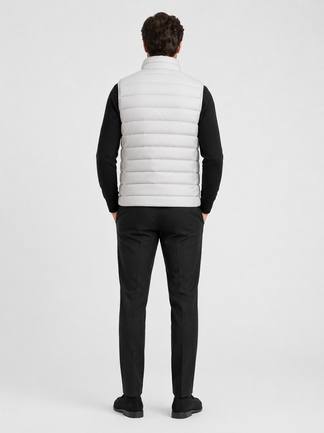 Men’s light gray insulated puffer vest comfortable sleeveless outerwear for hiking, travel, and casual outfits