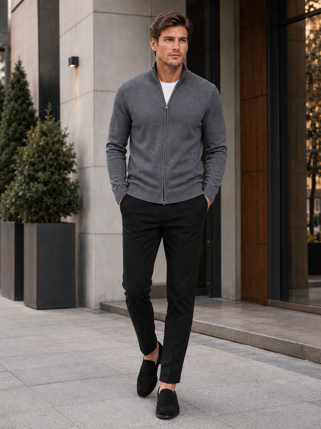 Man wearing a gray full zip knit cardigan sweater in a business casual fall winter outfit for everyday wear