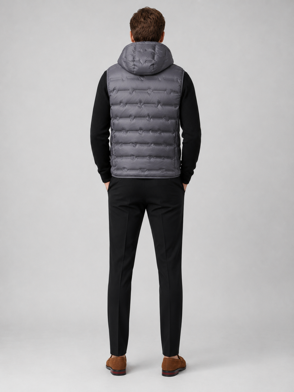 Men’s gray insulated hooded puffer vest comfortable sleeveless outerwear for hiking, travel, and casual outfits