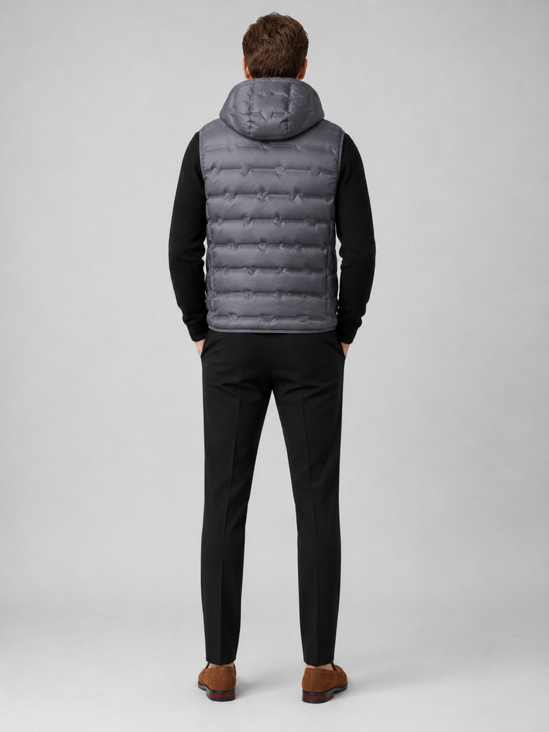 Men’s gray insulated hooded puffer vest comfortable sleeveless outerwear for hiking, travel, and casual outfits