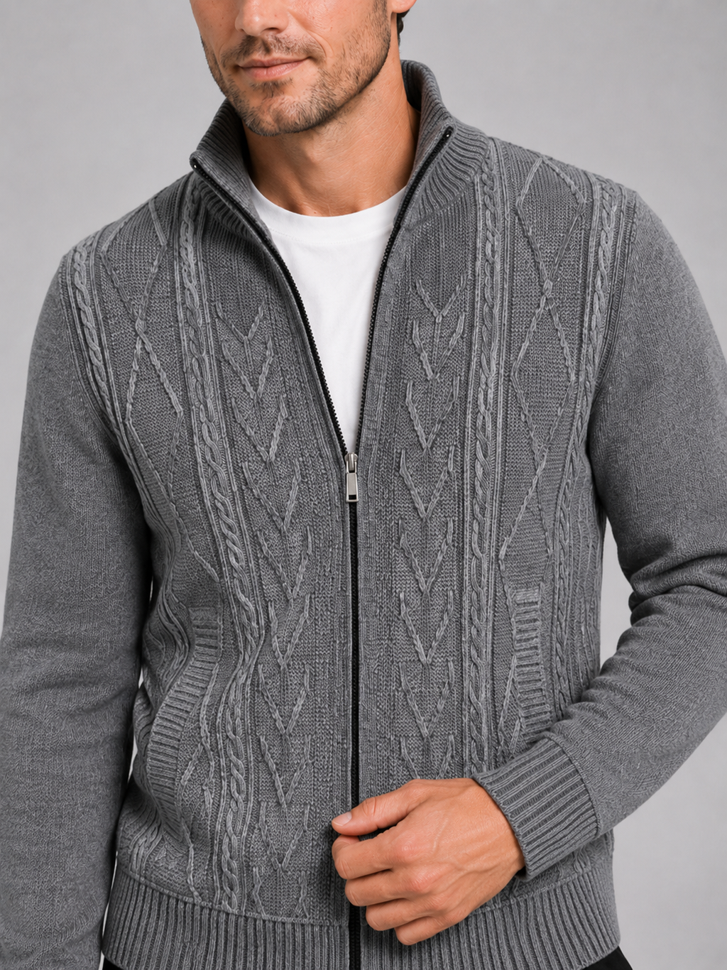 Close up of gray full zip sweater showing thick knit texture and stand collar detail