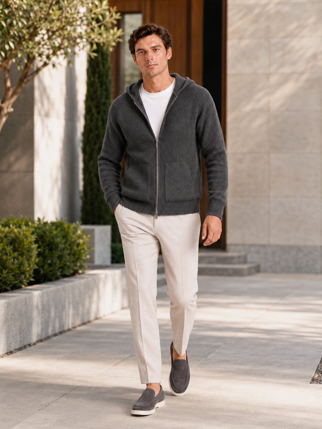 Man styling gray merino wool zip hoodie cardigan in a clean fall winter lifestyle outfit