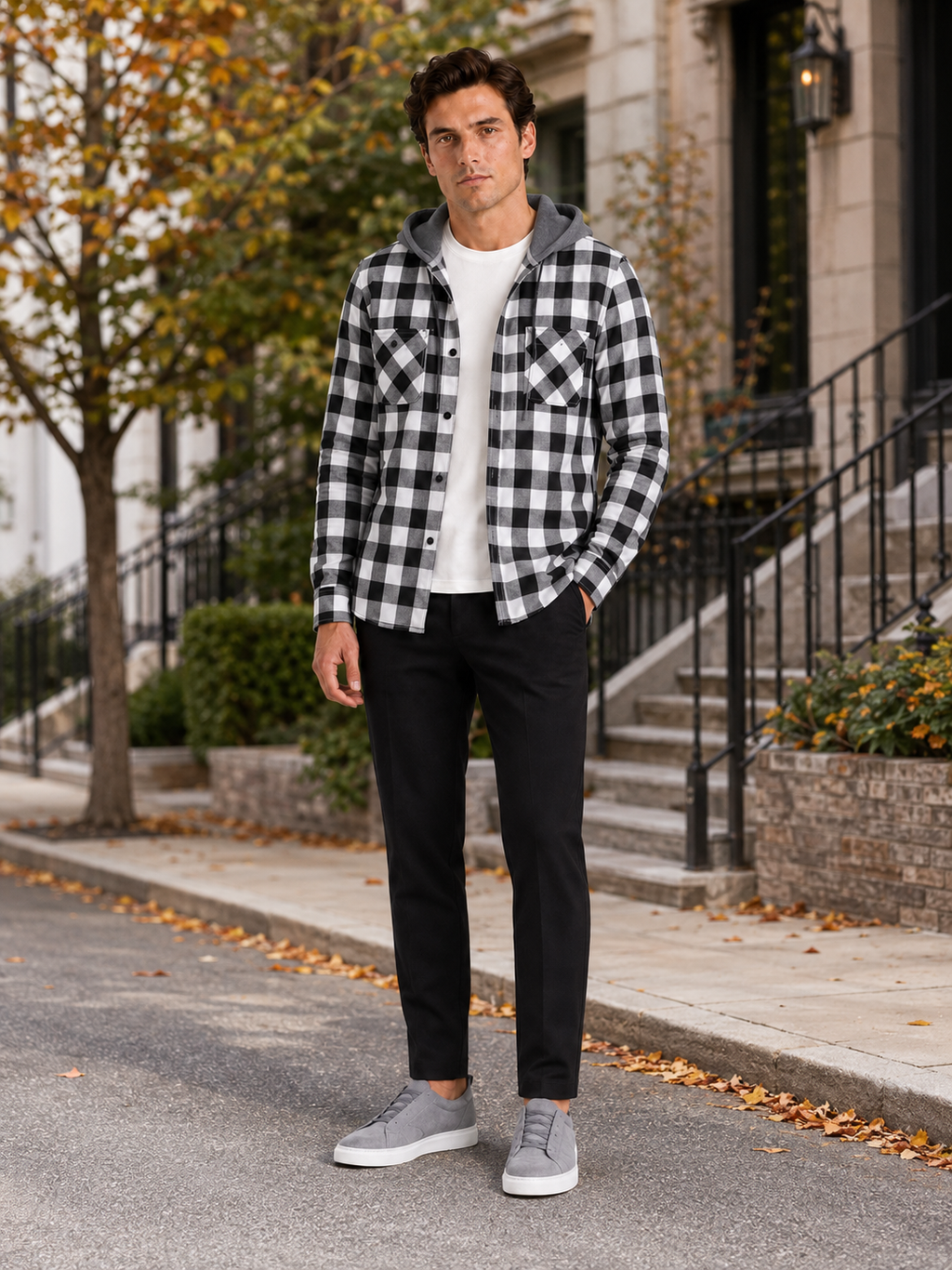 Man styling gray plaid hooded flannel jacket in a clean fall outdoor lifestyle outfit