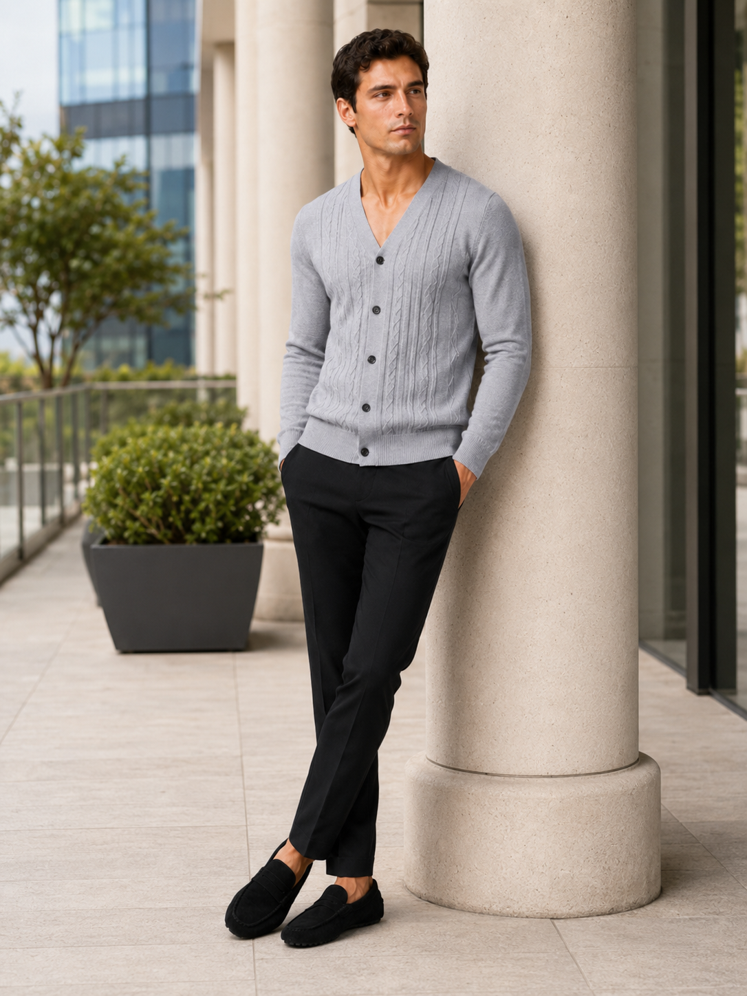 Man styling gray v neck cardigan sweater in a clean everyday smart casual outfit
