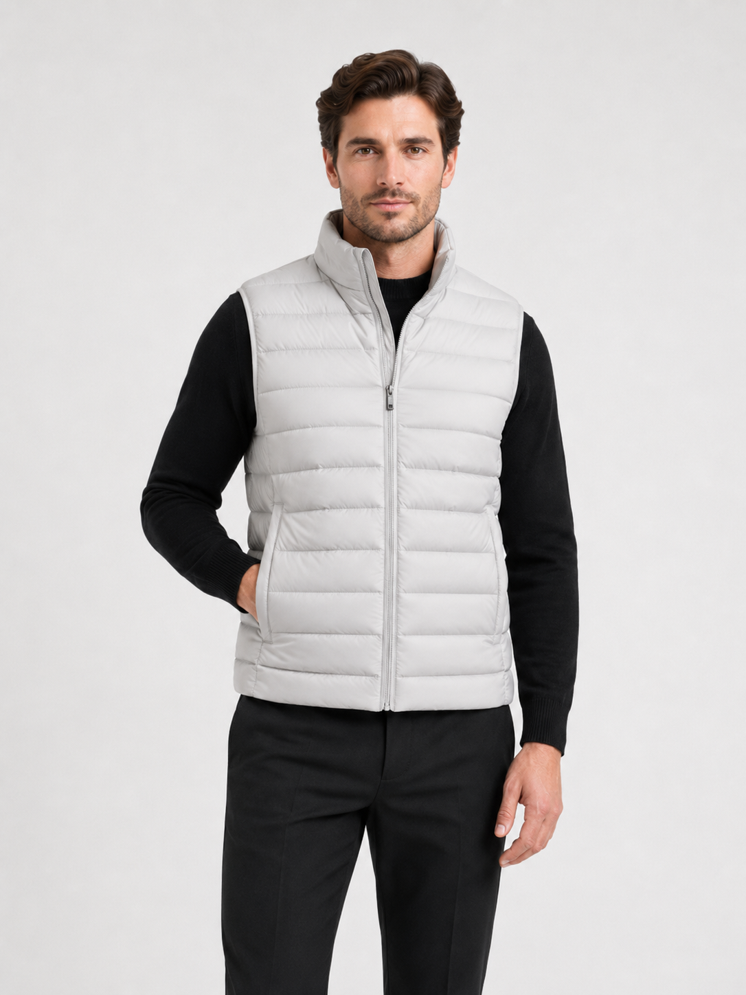 Men wearing light gray down vest thick warm zip up windproof waterproof winter outdoor style