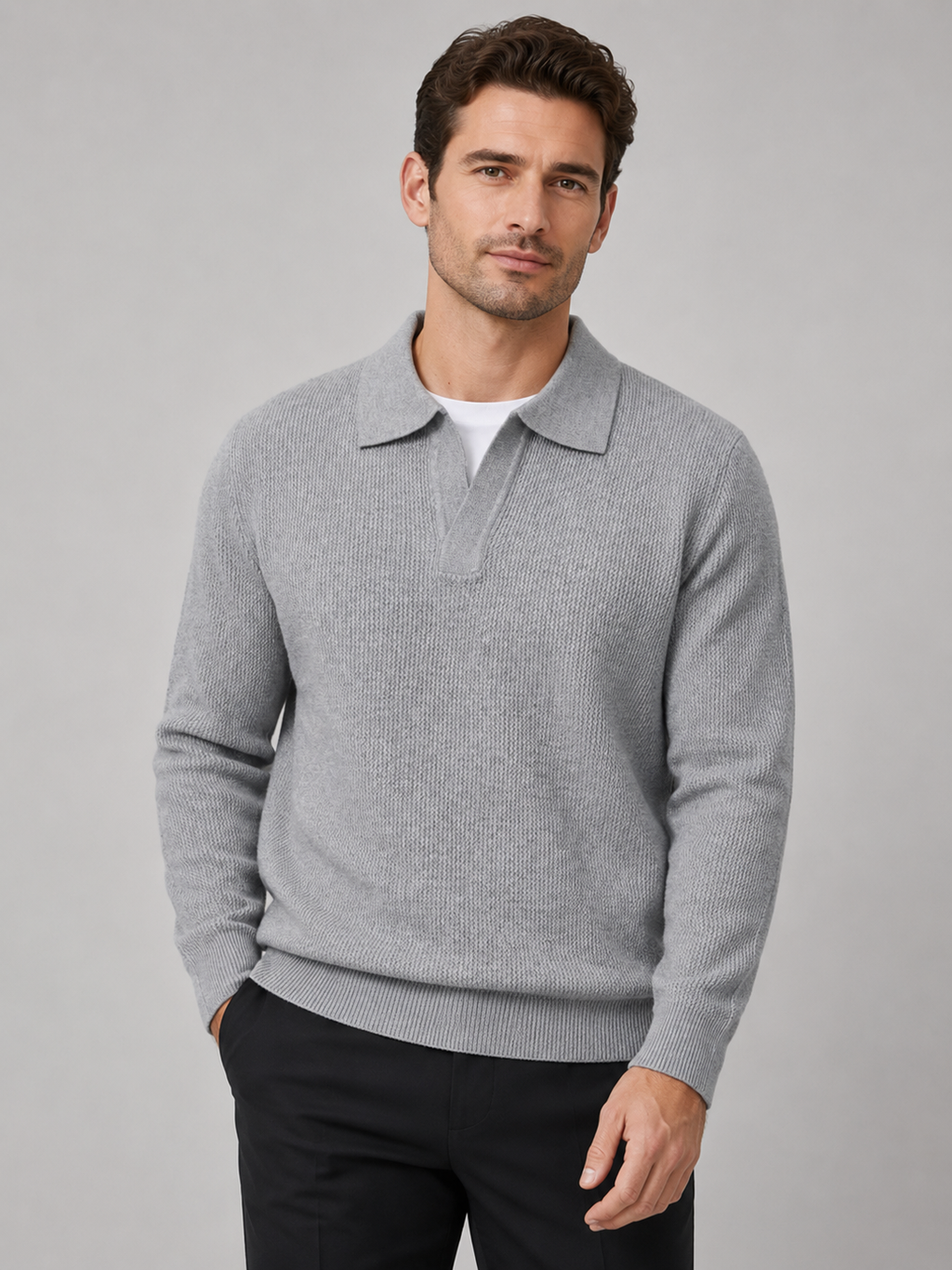 Front view of a man wearing a gray heavyweight knit Johnny collar sweater with long sleeves