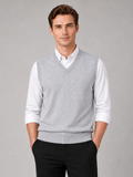 Men wearing gray sweater vest v neck solid color knit fall winter business casual style