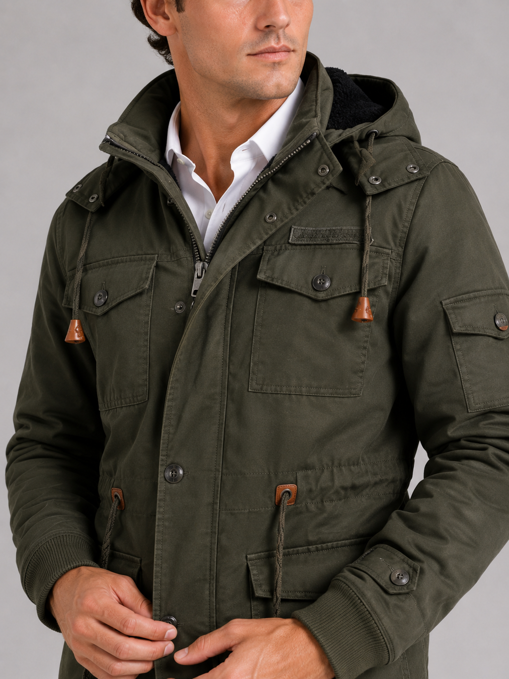 Close up of green cotton jacket showing soft fleece lining and durable zipper detail