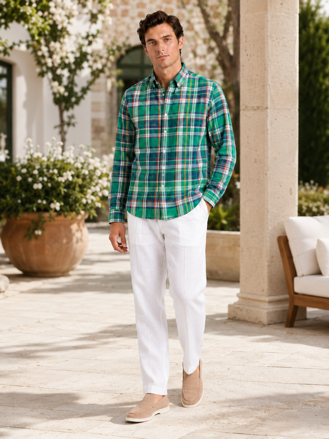 Man styling green madras button up shirt in a clean spring everyday lifestyle outfit