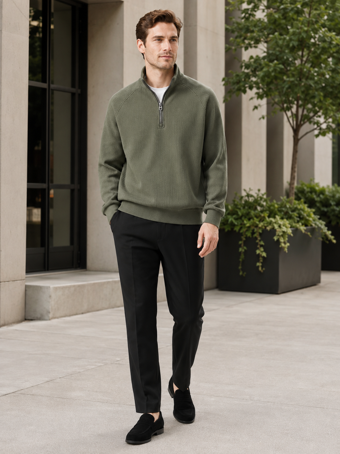 Man styling green quarter zip sweater in a relaxed everyday fall lifestyle outfit