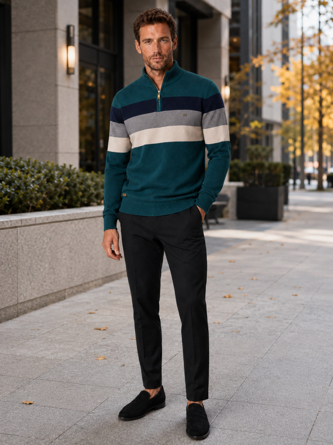 Man wearing a green patchwork cotton quarter zip sweater in a smart casual winter outfit