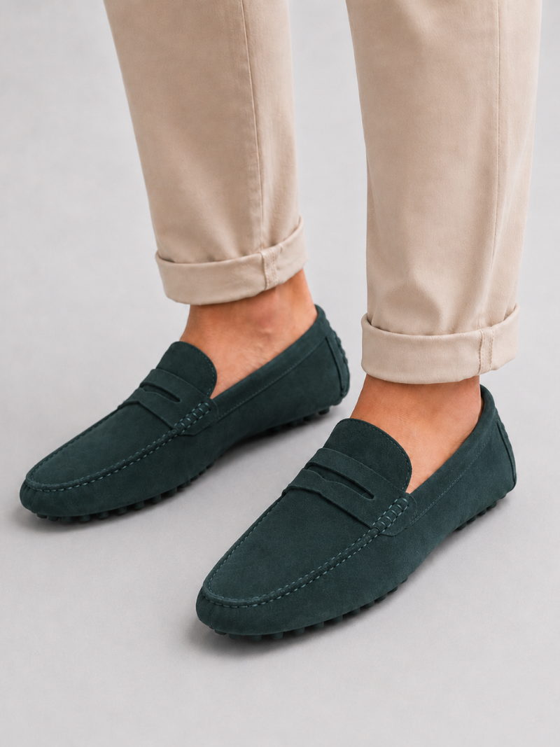 Men wearing green suede penny loafers handmade leather slip on driving shoes for smart casual wear