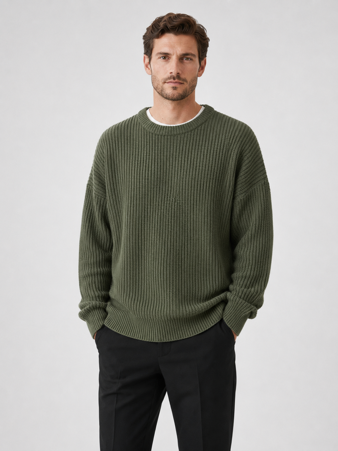 Men wearing green crewneck sweater loose fit solid color fall business casual style