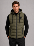 Front view of a man wearing a green hooded puffer vest with cotton padding, thick insulation, sleeveless design, and full zip front