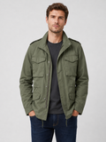 Men wearing green military field jacket 100 percent cotton multi pocket zip up fall outdoor style