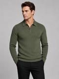 Front view of a man wearing a green quarter zip long sleeve polo with a lapel collar and tailored business casual fit
