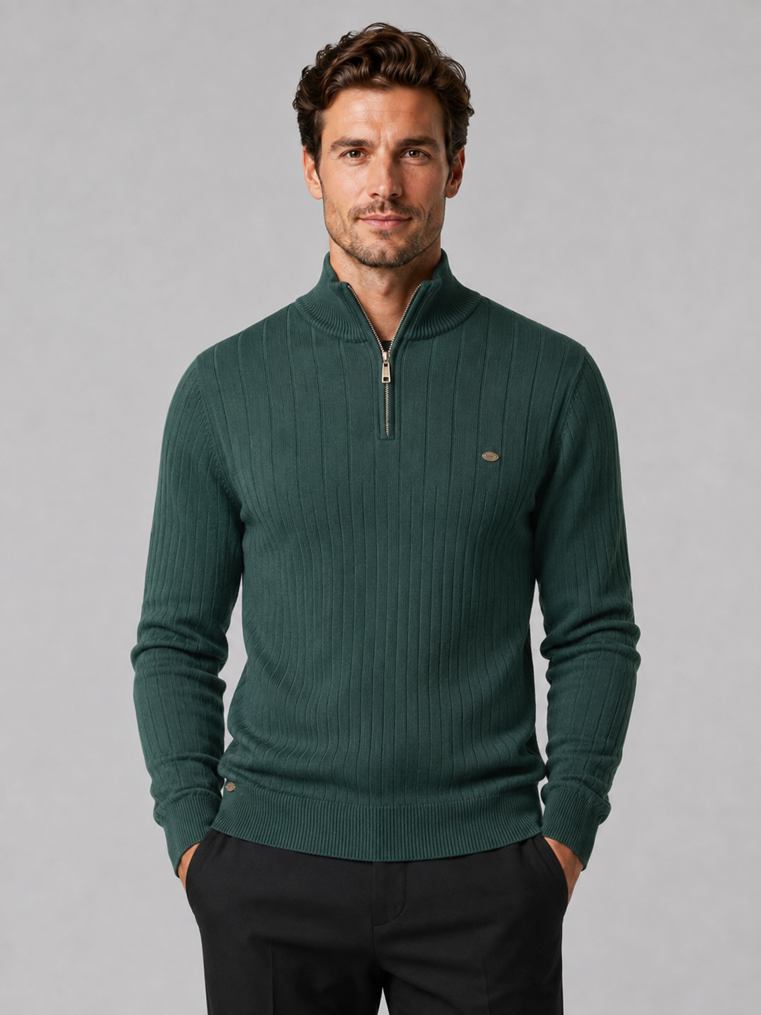 Front view of a man wearing a green quarter zip pullover sweater with a stand collar, warm cotton knit, and long sleeves