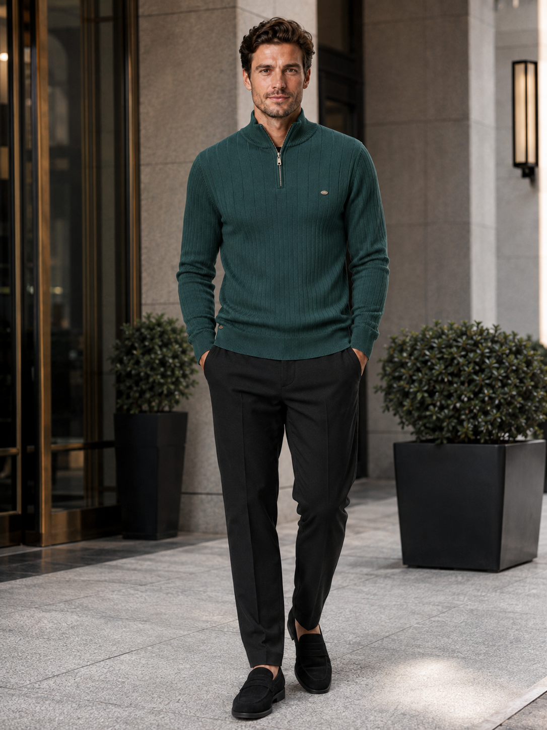 Man wearing a green quarter zip cotton knit sweater in a business casual fall winter outfit for everyday wear