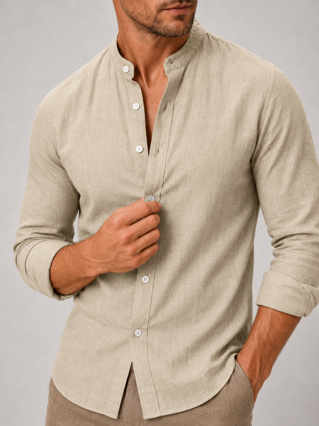 Close up of khaki cotton linen shirt showing lightweight breathable fabric and band collar detail