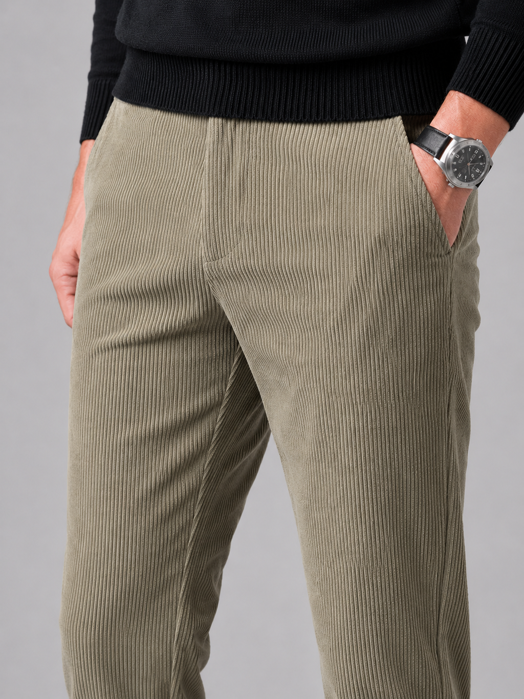 Close up of khaki corduroy pants showing soft ribbed texture and stretch fabric detail