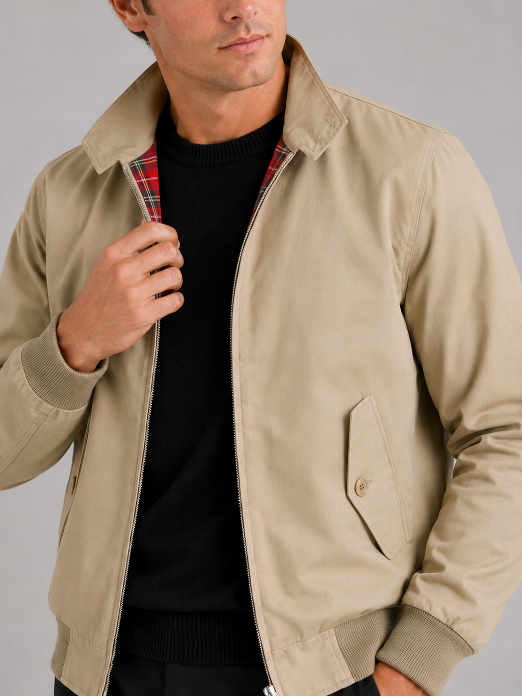 Close up of khaki Harrington jacket showing smooth breathable fabric and zipper detail