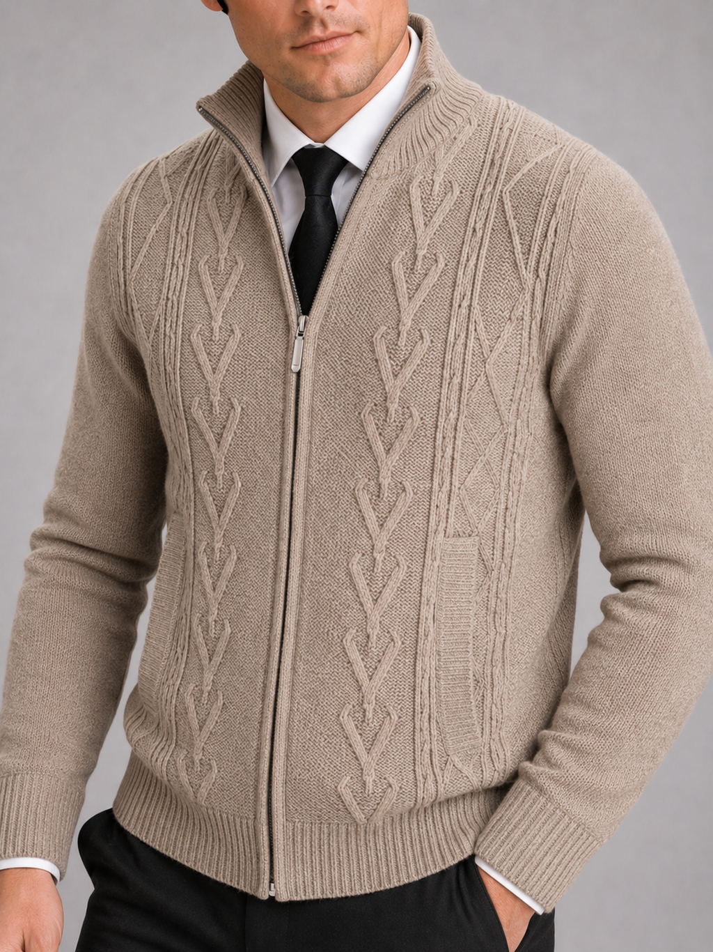 Close up of khaki full zip sweater showing thick knit texture and stand collar detail