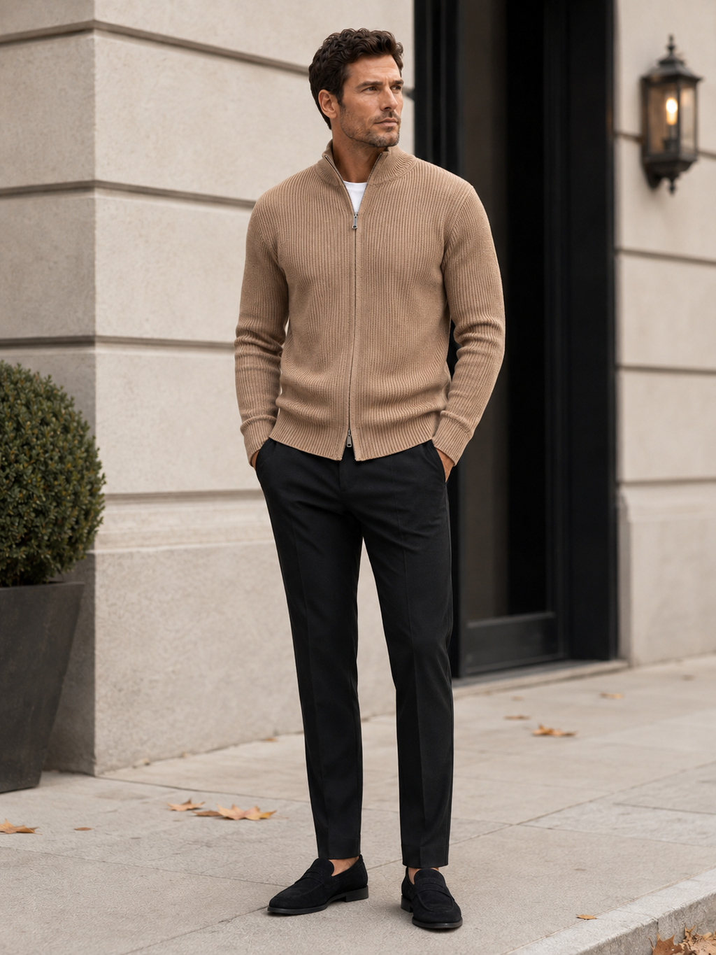 Man wearing a khaki ribbed knit full zip cardigan sweater in a casual fall winter outfit for everyday wear