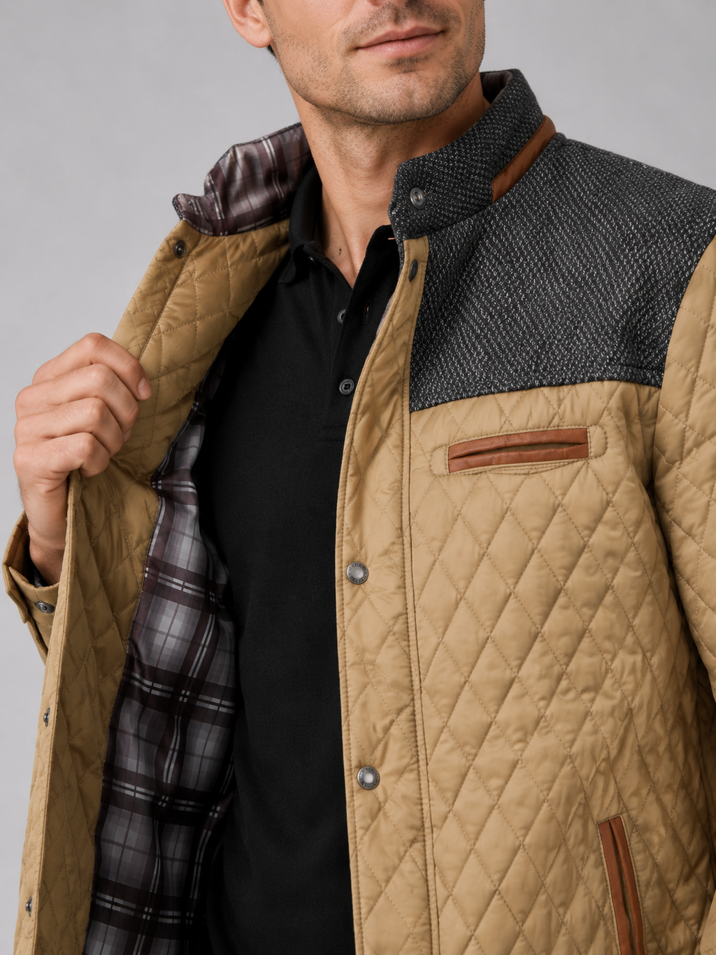 Close up of khaki quilted jacket showing diamond stitching and button down front detail