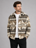 Front view of a man wearing a khaki heavyweight flannel shirt jacket with a wool blend, ethnic print, button-up front, and relaxed shacket fit