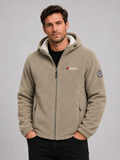 Front view of a man wearing a khaki hooded fleece jacket with a windproof design, thick warm construction, and full zip front