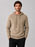Front view of a man wearing a khaki wool hoodie sweater with a soft knit design, attached hood, and long sleeves