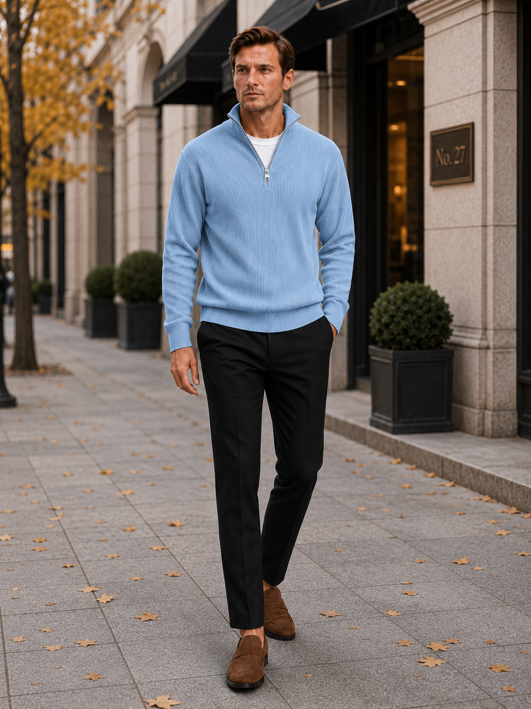 Man styling light blue ribbed quarter zip sweater in a fresh everyday winter lifestyle outfit