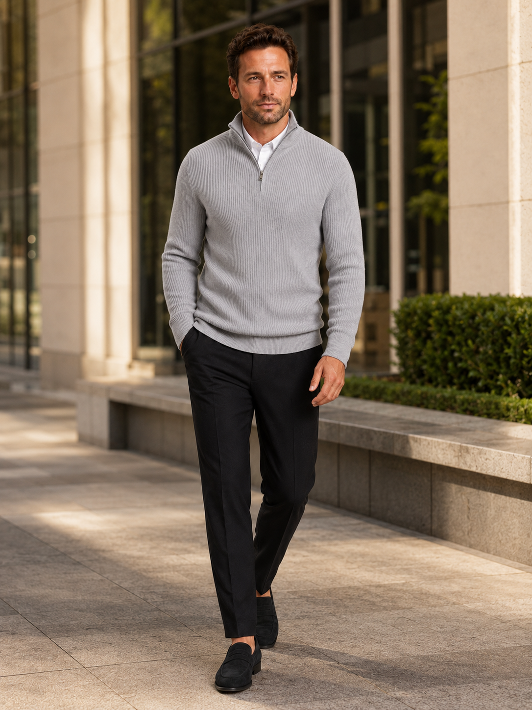 Man wearing a light gray slim fit quarter zip mock neck sweater in a clean everyday winter outfit
