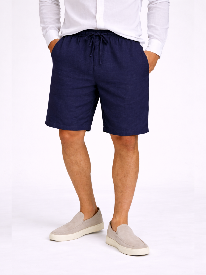 Men wearing navy linen drawstring shorts relaxed fit lightweight breathable summer casual style