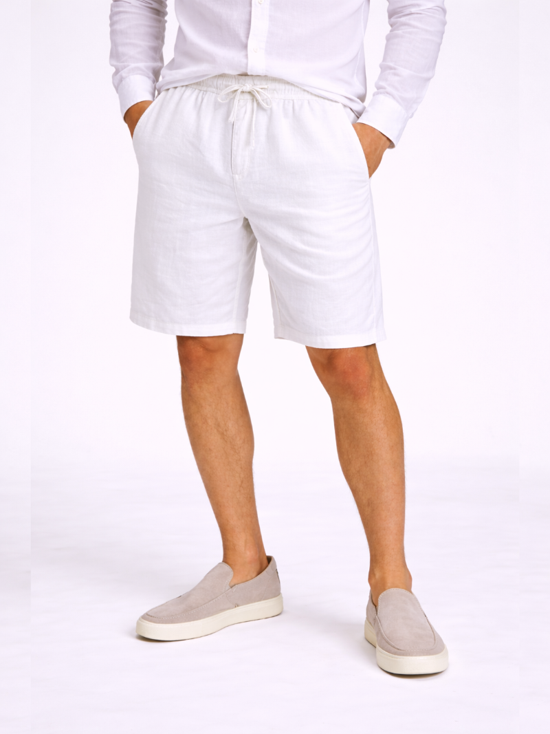 Men wearing white linen drawstring shorts relaxed fit lightweight breathable summer style