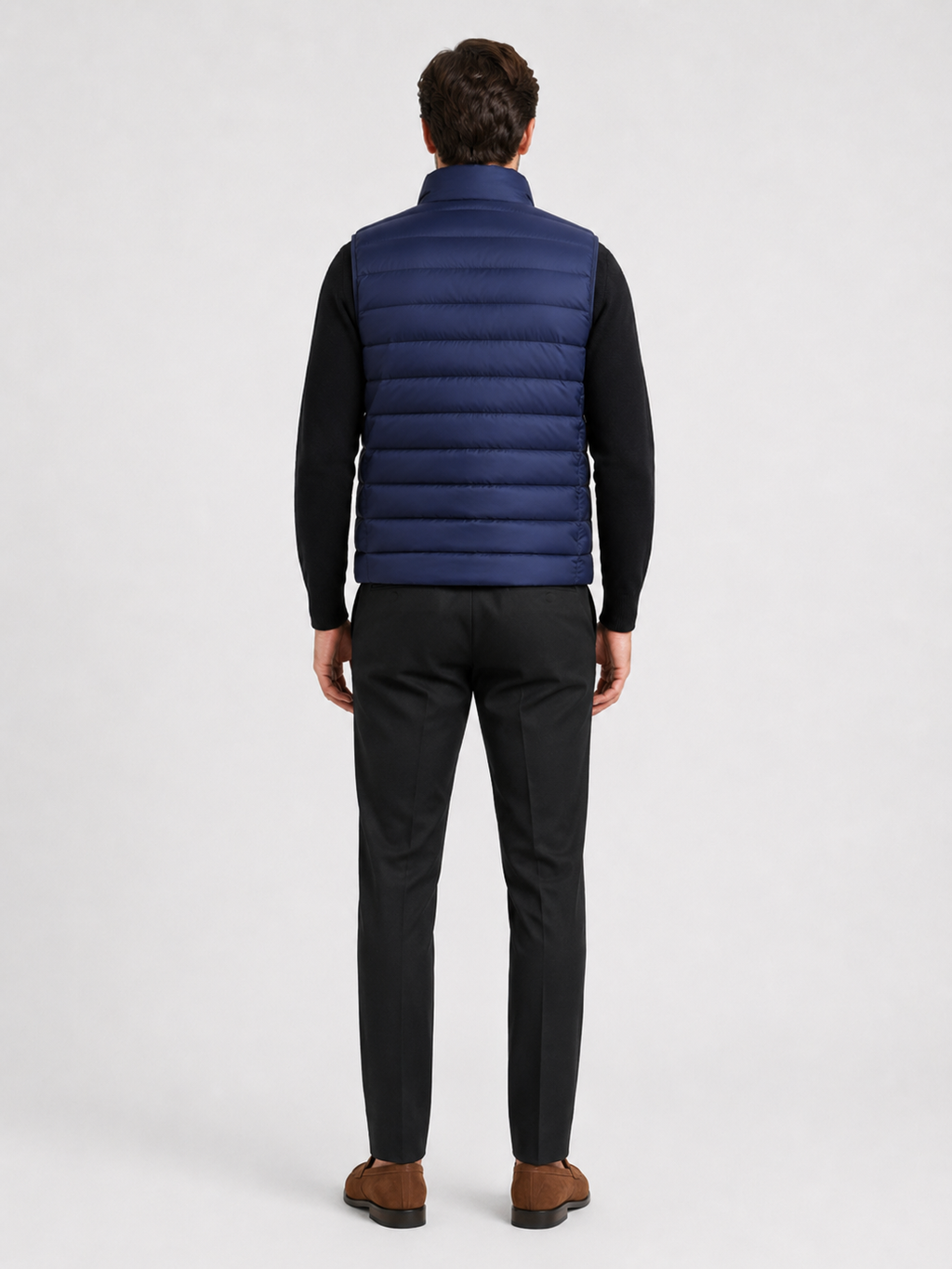 Men’s navy insulated puffer vest comfortable sleeveless outerwear for hiking, travel, and casual outfits