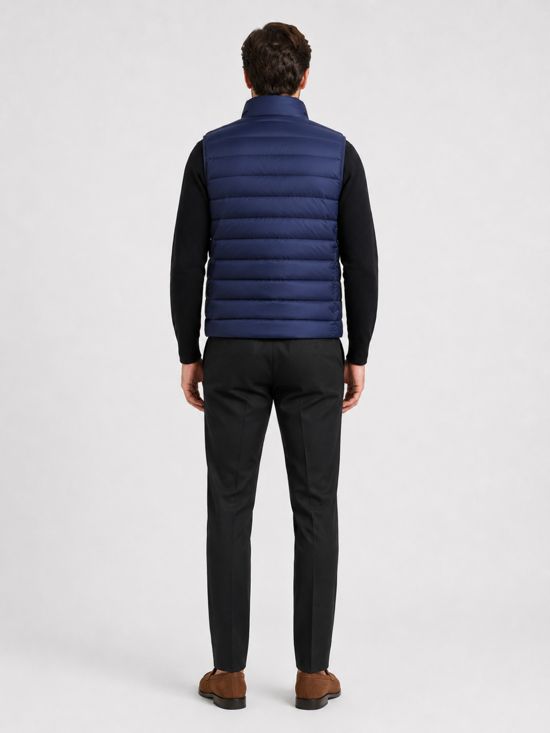 Men’s navy insulated puffer vest comfortable sleeveless outerwear for hiking, travel, and casual outfits