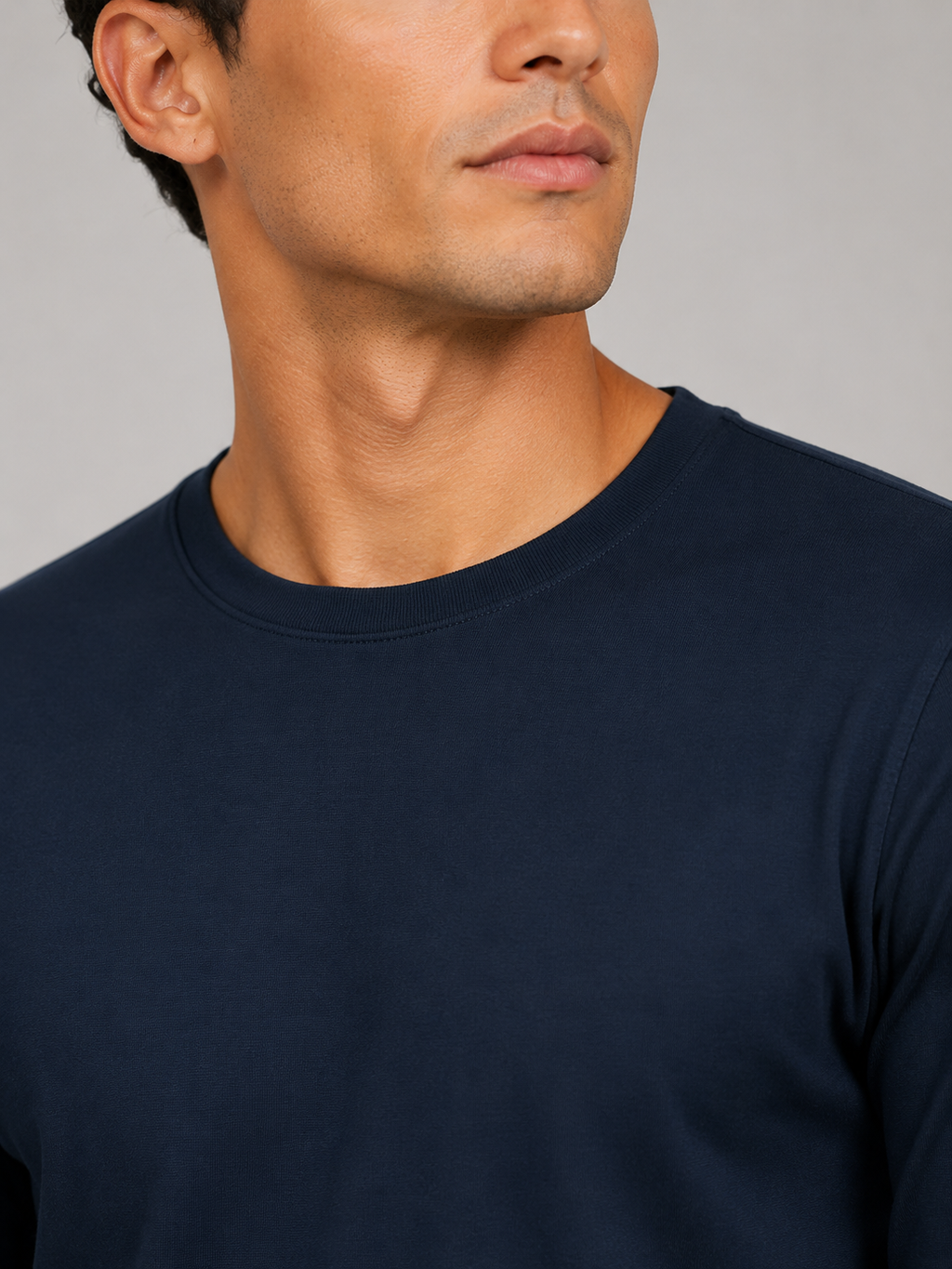Close up of navy t shirt fabric showing soft smooth breathable texture