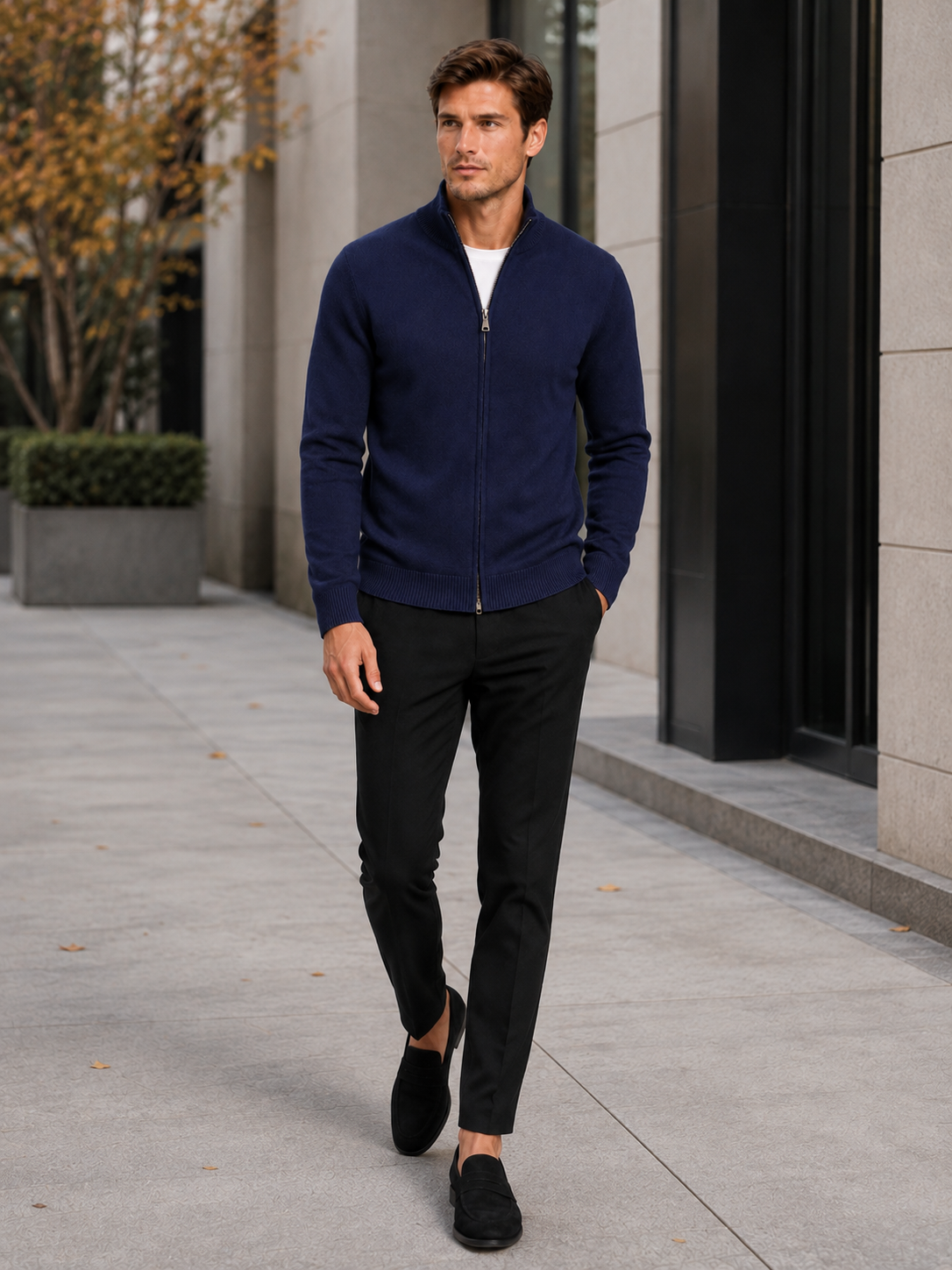 Man wearing a navy full zip knit cardigan sweater in a business casual fall winter outfit for everyday wear